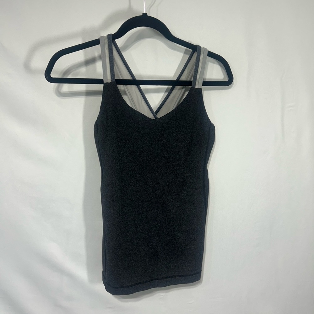 Lululemon dark gray with sheer strap workout tank with built in bra. Size 8.